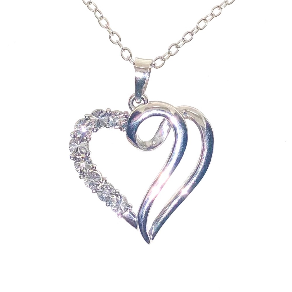 Diamond and silver heart pendant